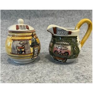 Sakura Warren Kimble Bistro Scenes Hand Painted Creamer and Covered Sugar Set